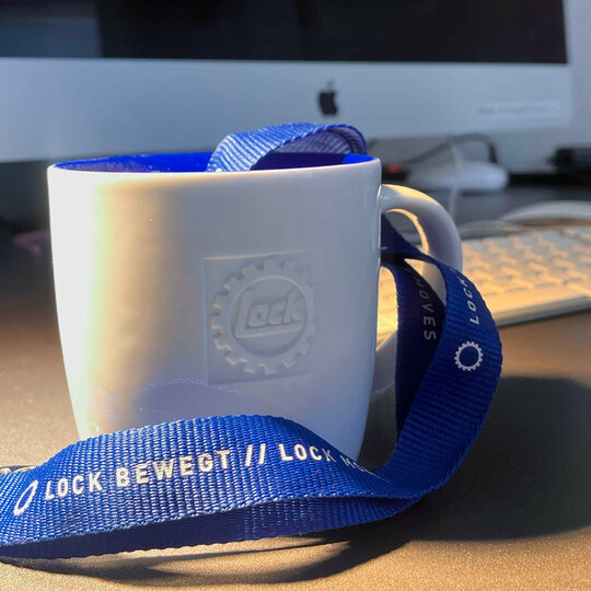 Werbeartikel Tasse und Schlüsselband